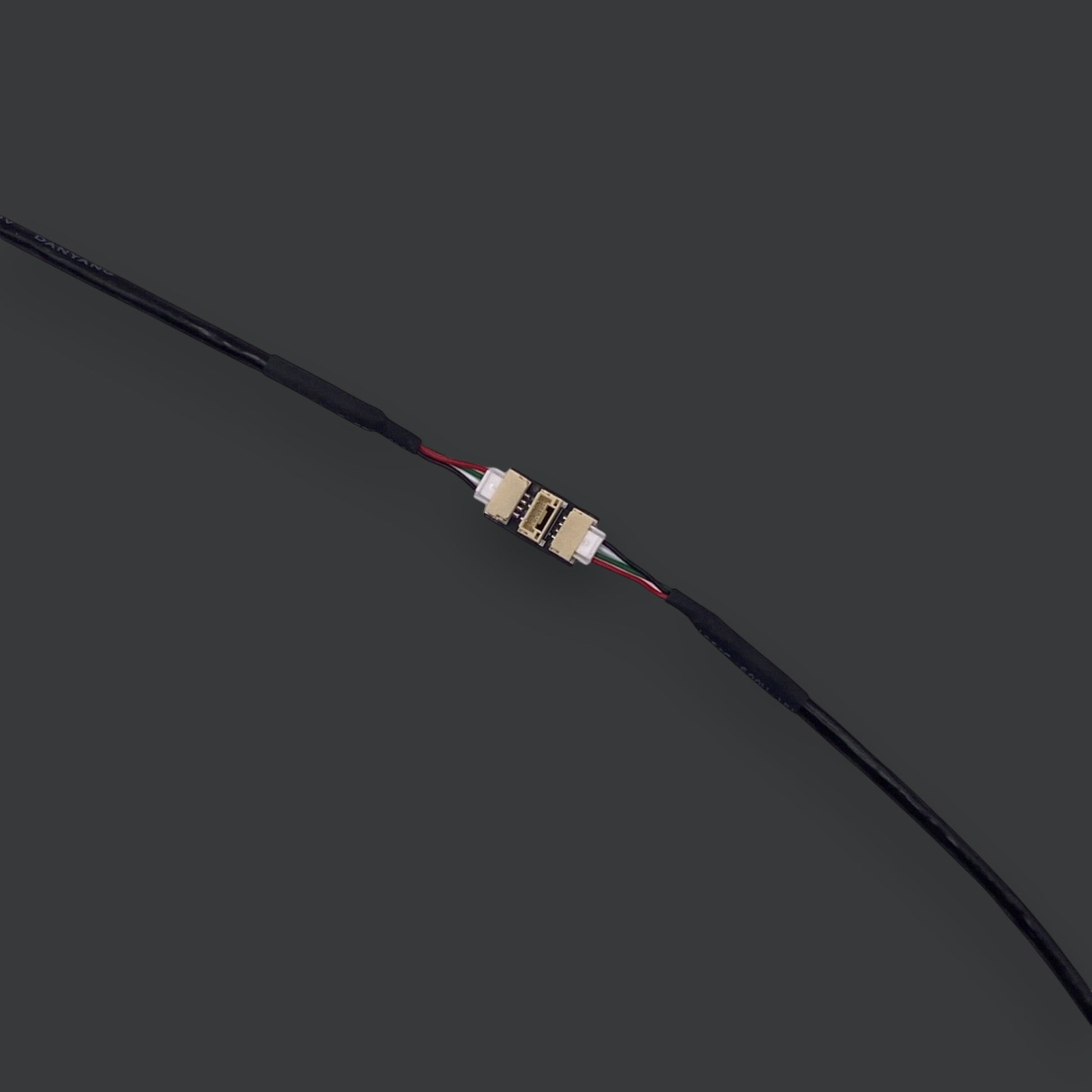 Beyond Robotix CAN and I2C T-Junction adapter with three 4-pin JST-GH ports for UAV and drone sensor integration.